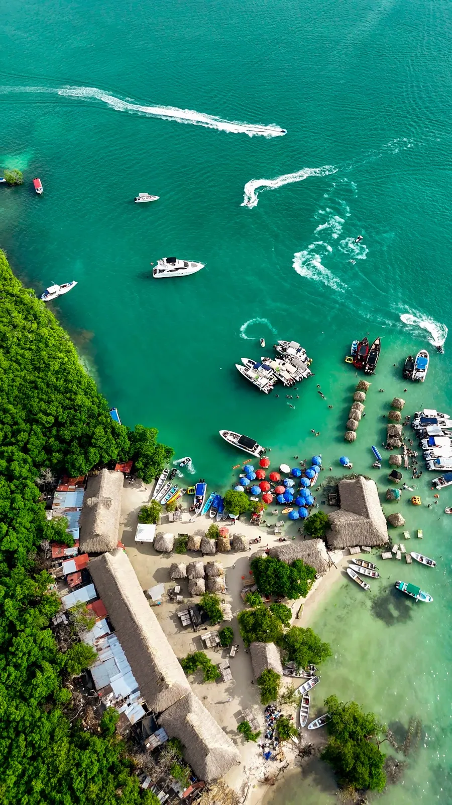 Aerial view of Cholón, its boats and turquoise waters