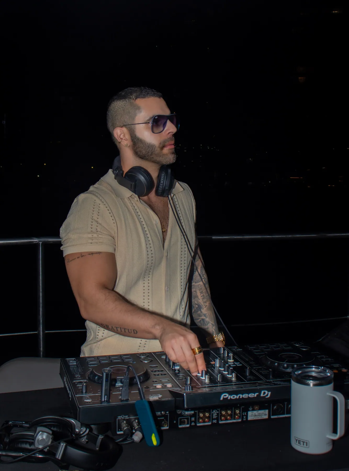 DJ leading an evening celebration onboard Mavi Soul