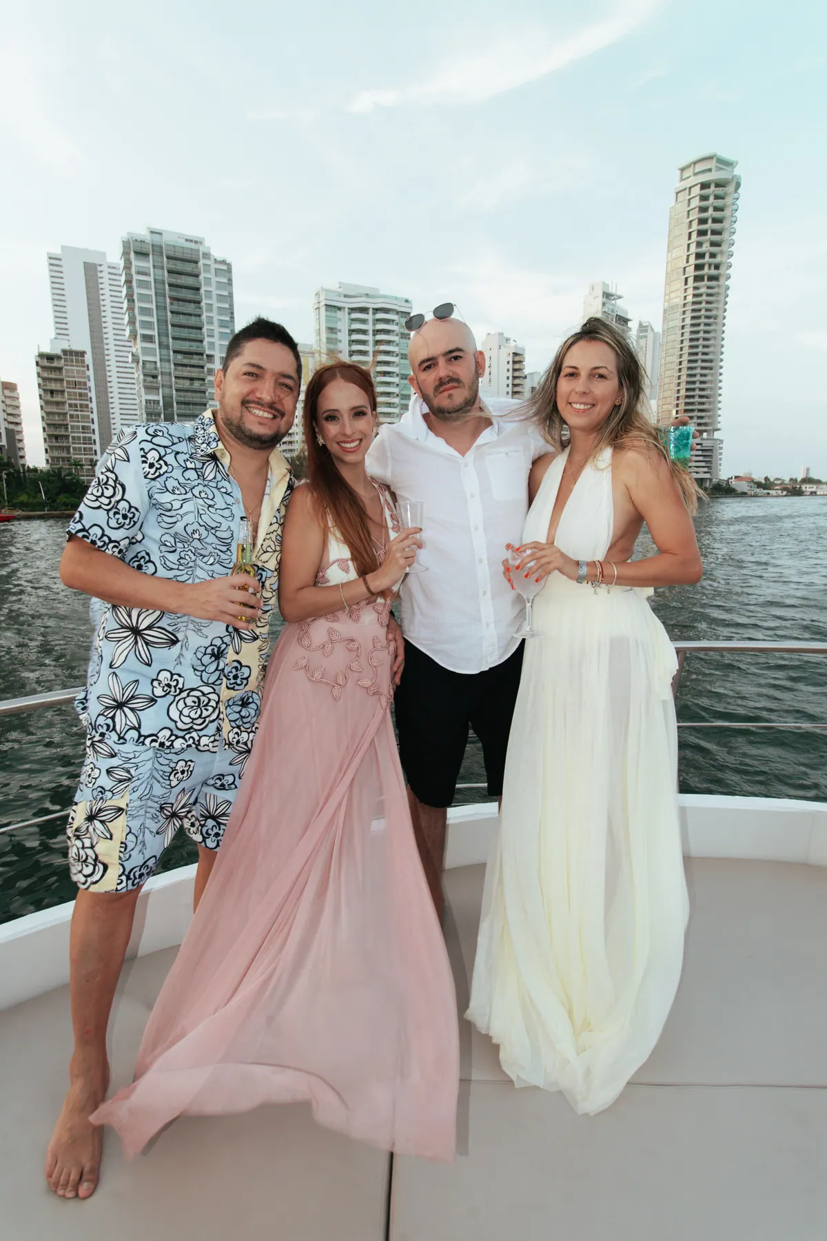 Friends posing at the bow during a celebration