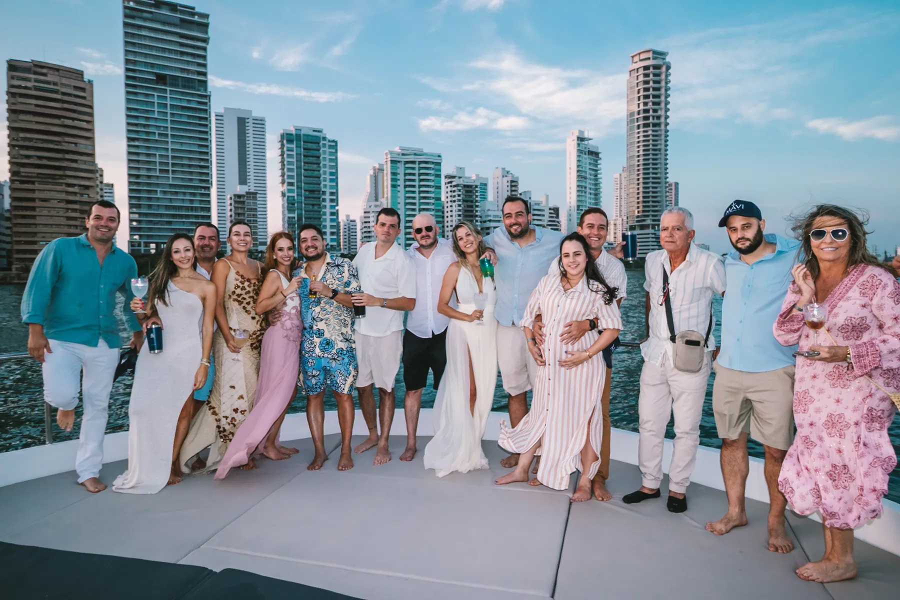 Group of friends celebrating at sunset in front of Cartagena