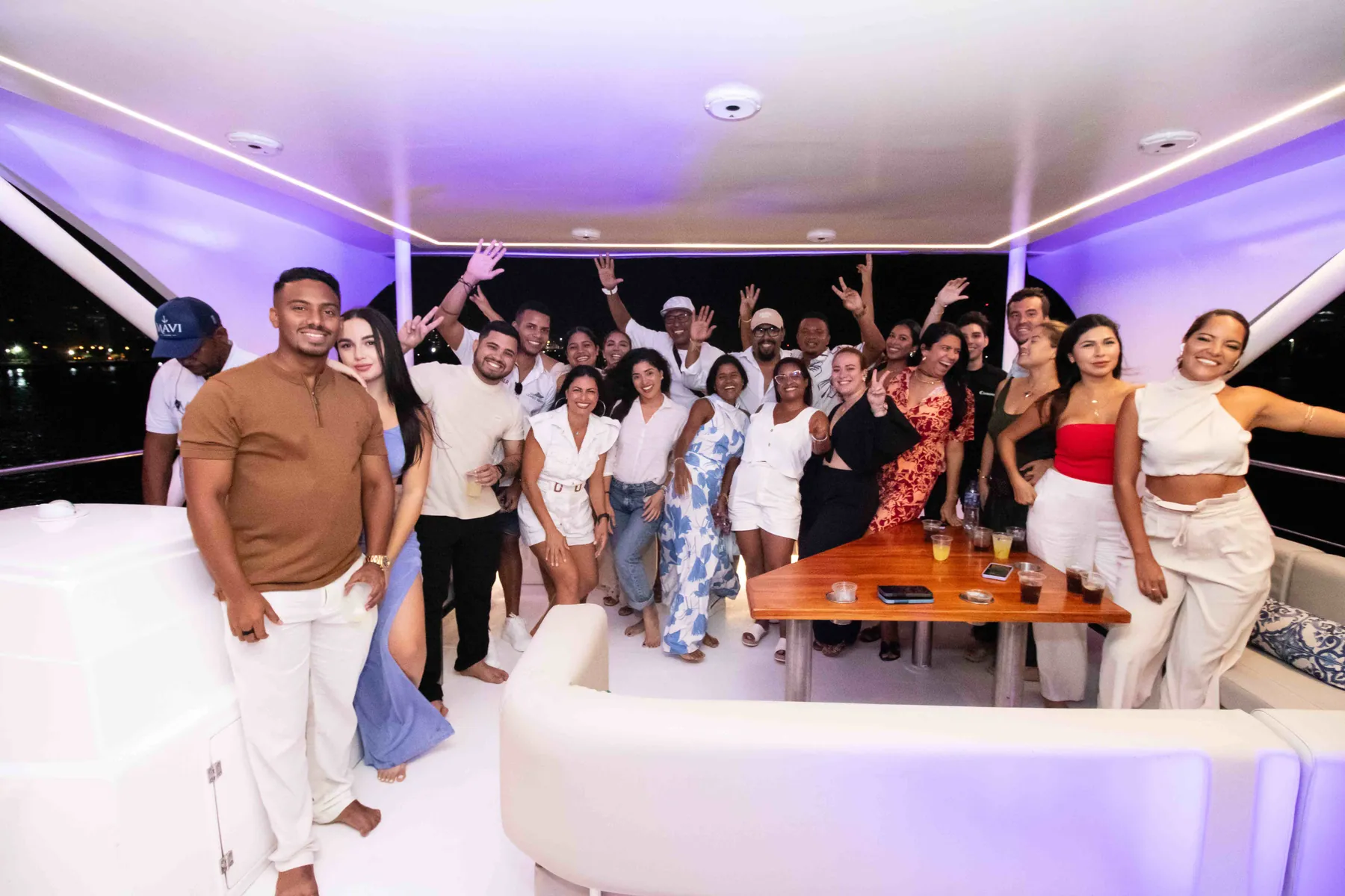 Large group enjoying an evening party onboard Mavi Soul