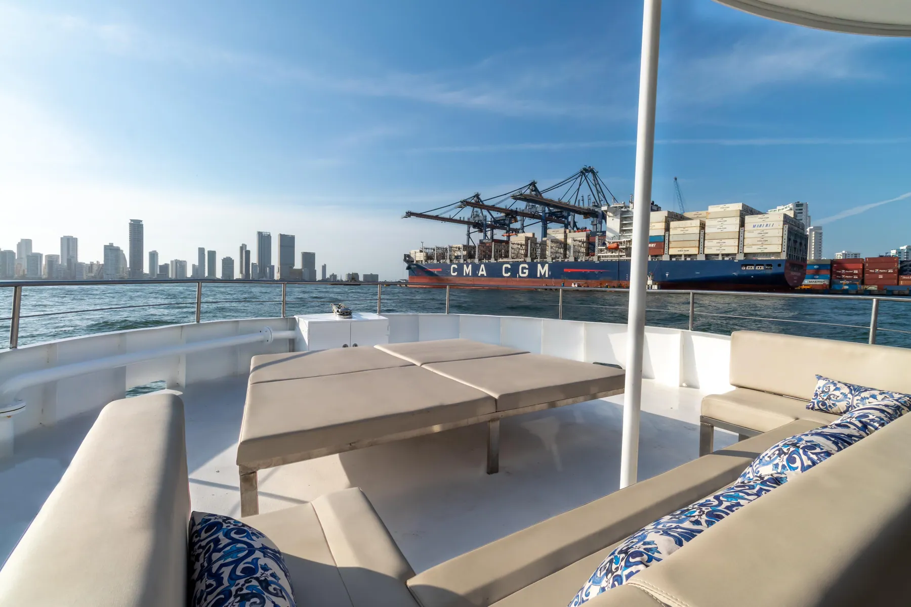 Outdoor social area with sofas and a view of Cartagena