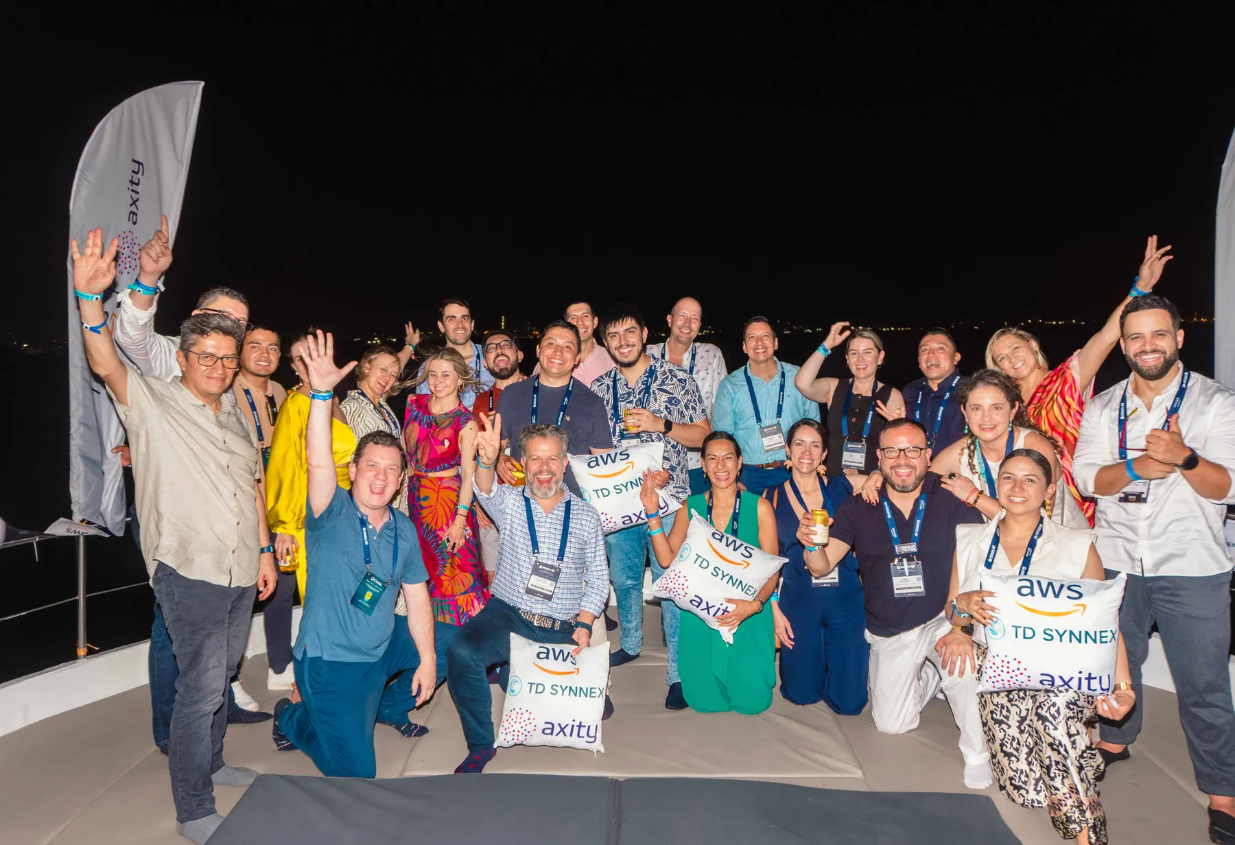 Corporate team gathered during a private onboard event