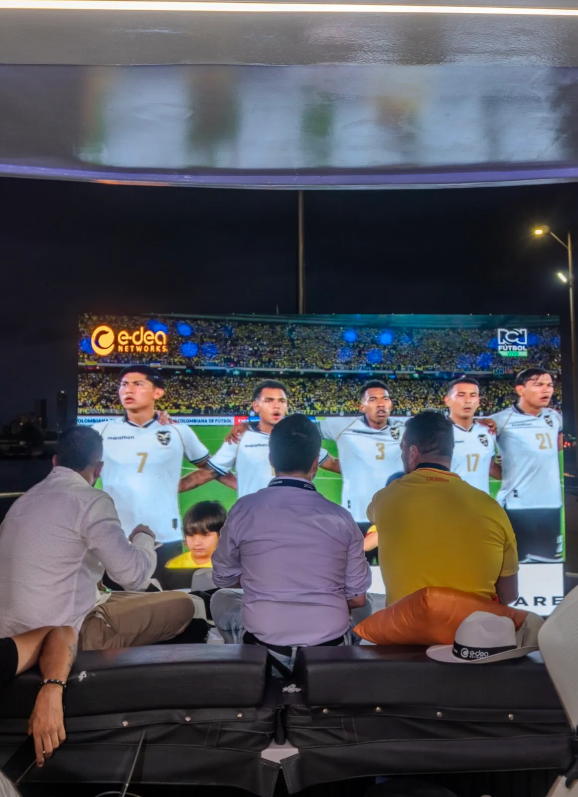 Guests watching a sporting event onboard MAVI
