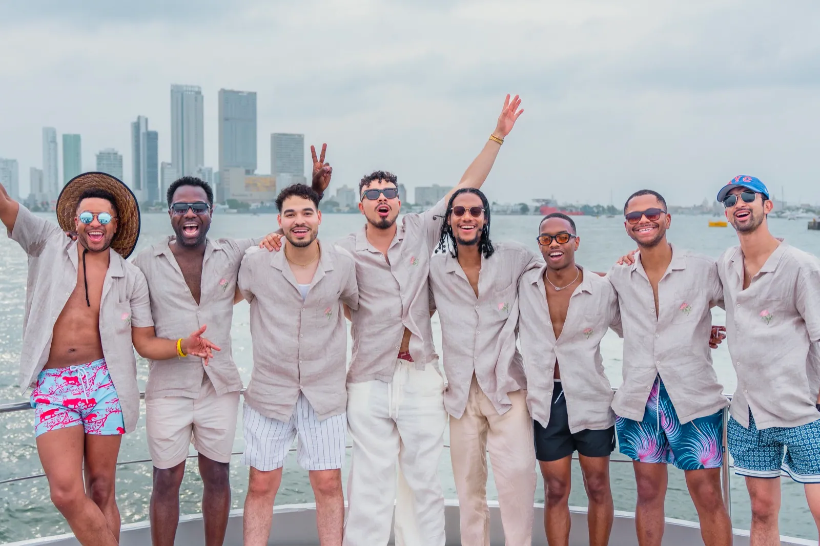 Group of friends celebrating in front of the Cartagena skyline